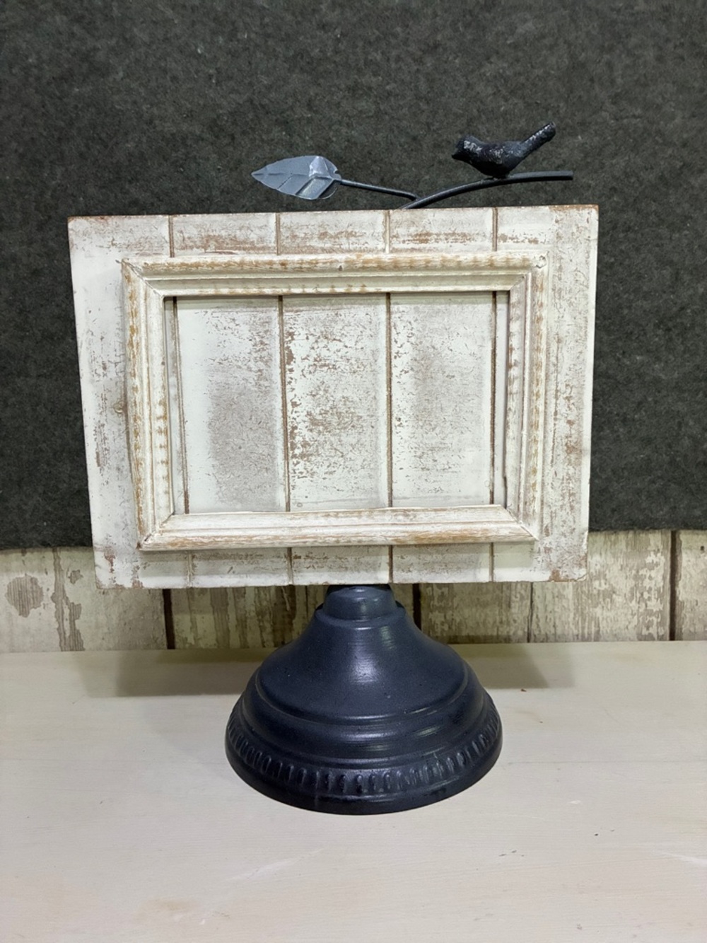 Source Unknown Distressed White Frame on Gray Pedestal with Bird Accent